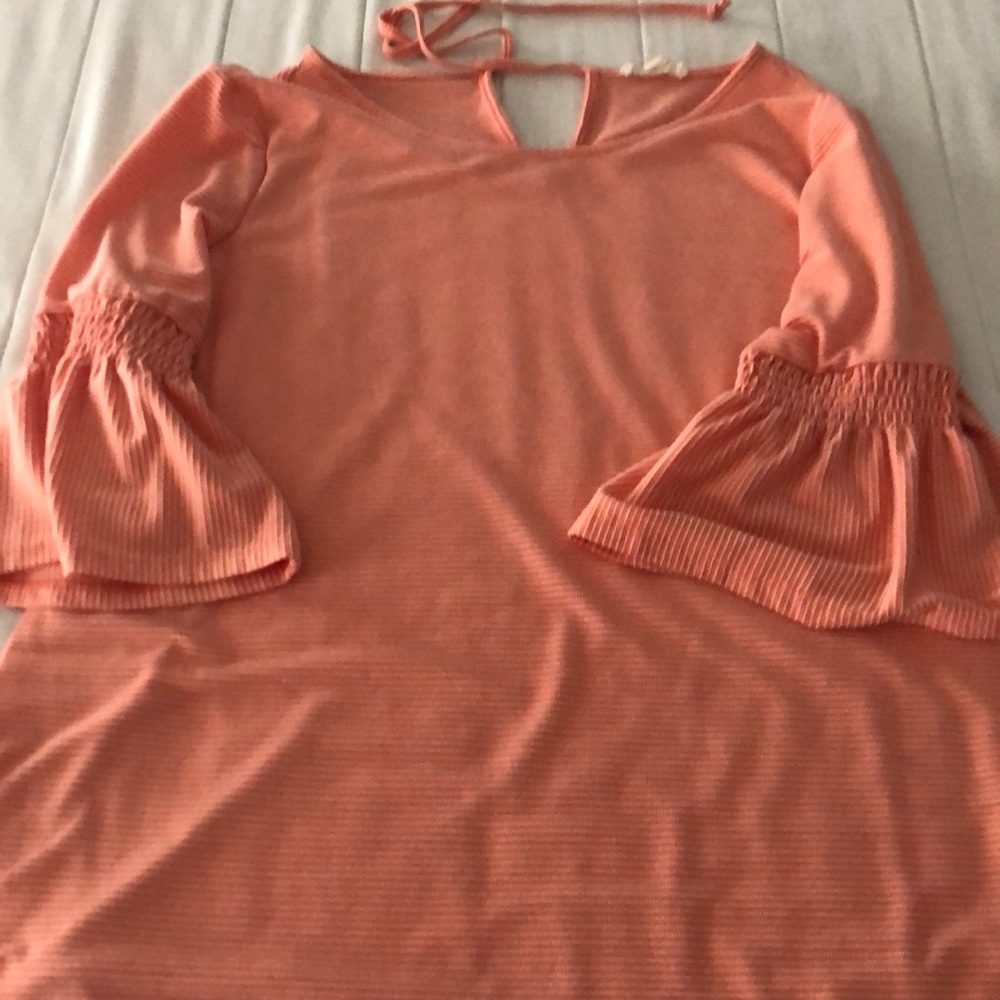 Peachy top with flared sleeves